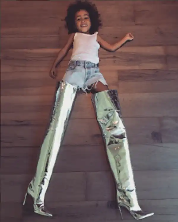 North West tries on her mum